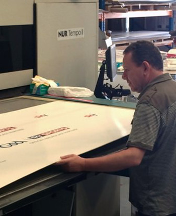 Paul with the NUR Tempo II 3.2m UV flatbed printer 